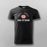 Black t-shirt with graphic design and text on a gray background