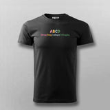 Black t-shirt with colorful text on a gray background