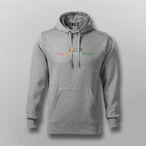 Gray hoodie with colorful text on a light gray background